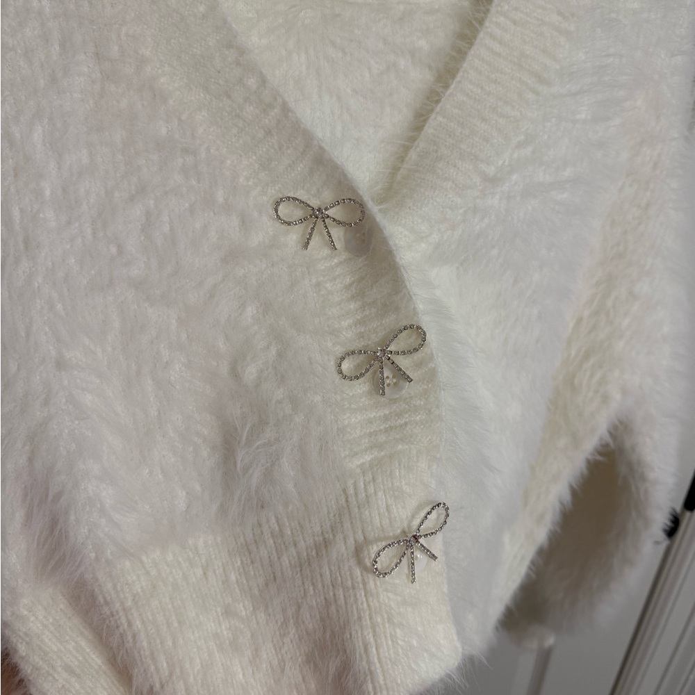 Elegant White Sweater with Bow Accents